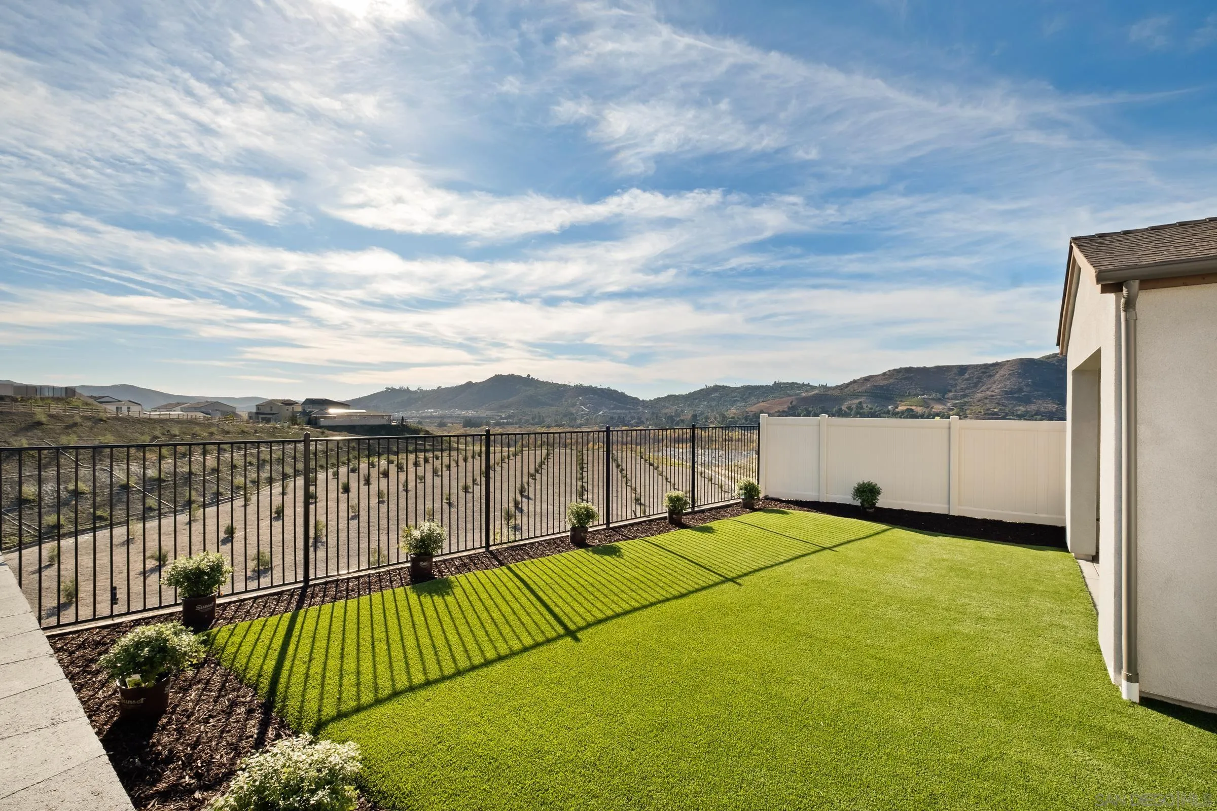 35164 Orchard Trail Fallbrook, CA 92028 - Photo 32 of 52 a view of a terrace with a garden