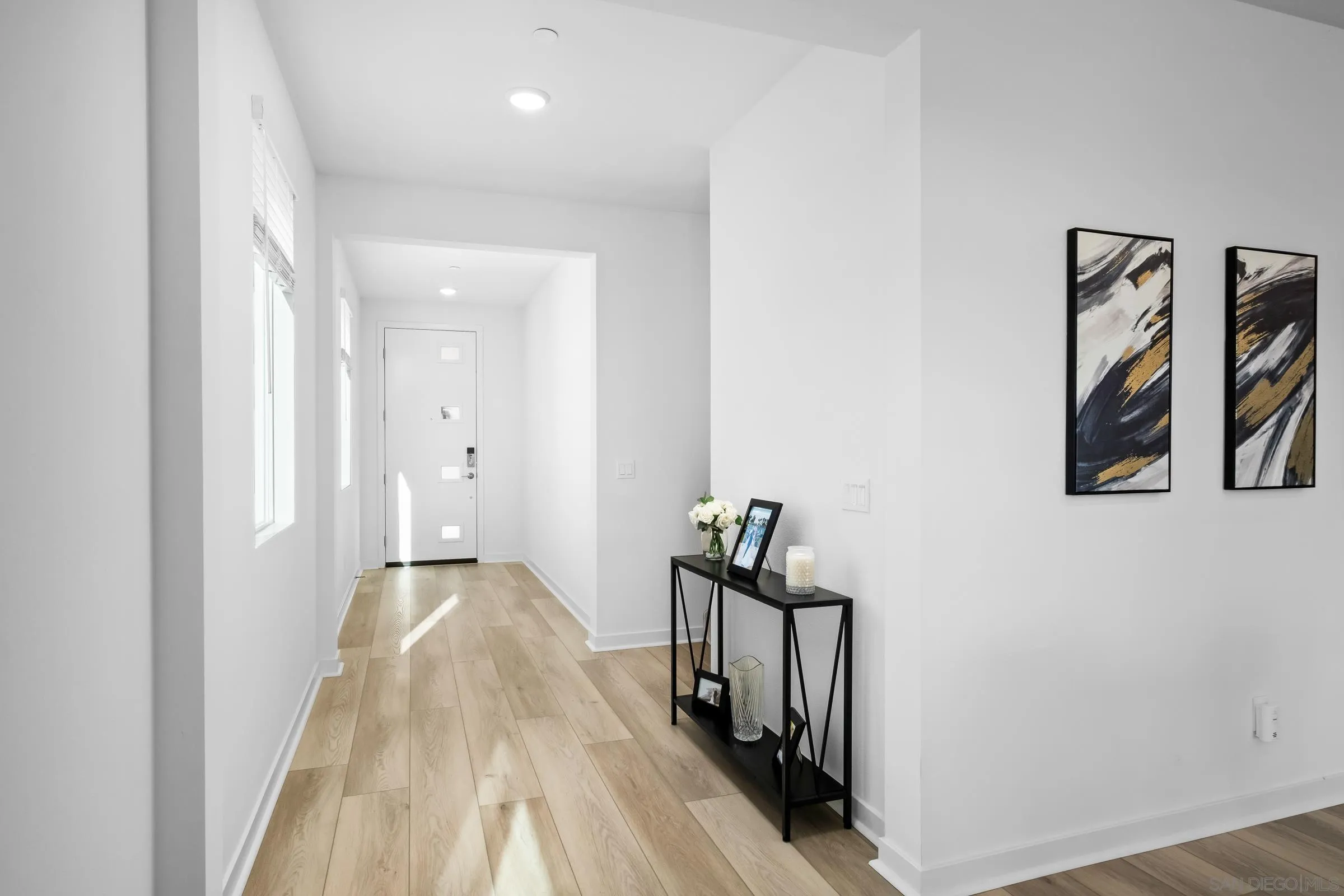 35164 Orchard Trail Fallbrook, CA 92028 - Photo 4 of 52 a view of a hallway with wooden floor and closet