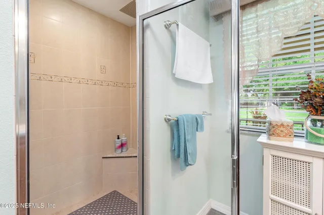 a view of a hallway with a white walls