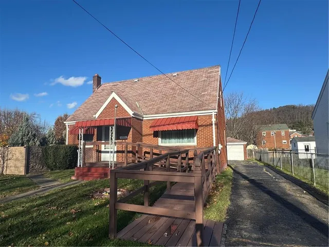 a view of house with outdoor space