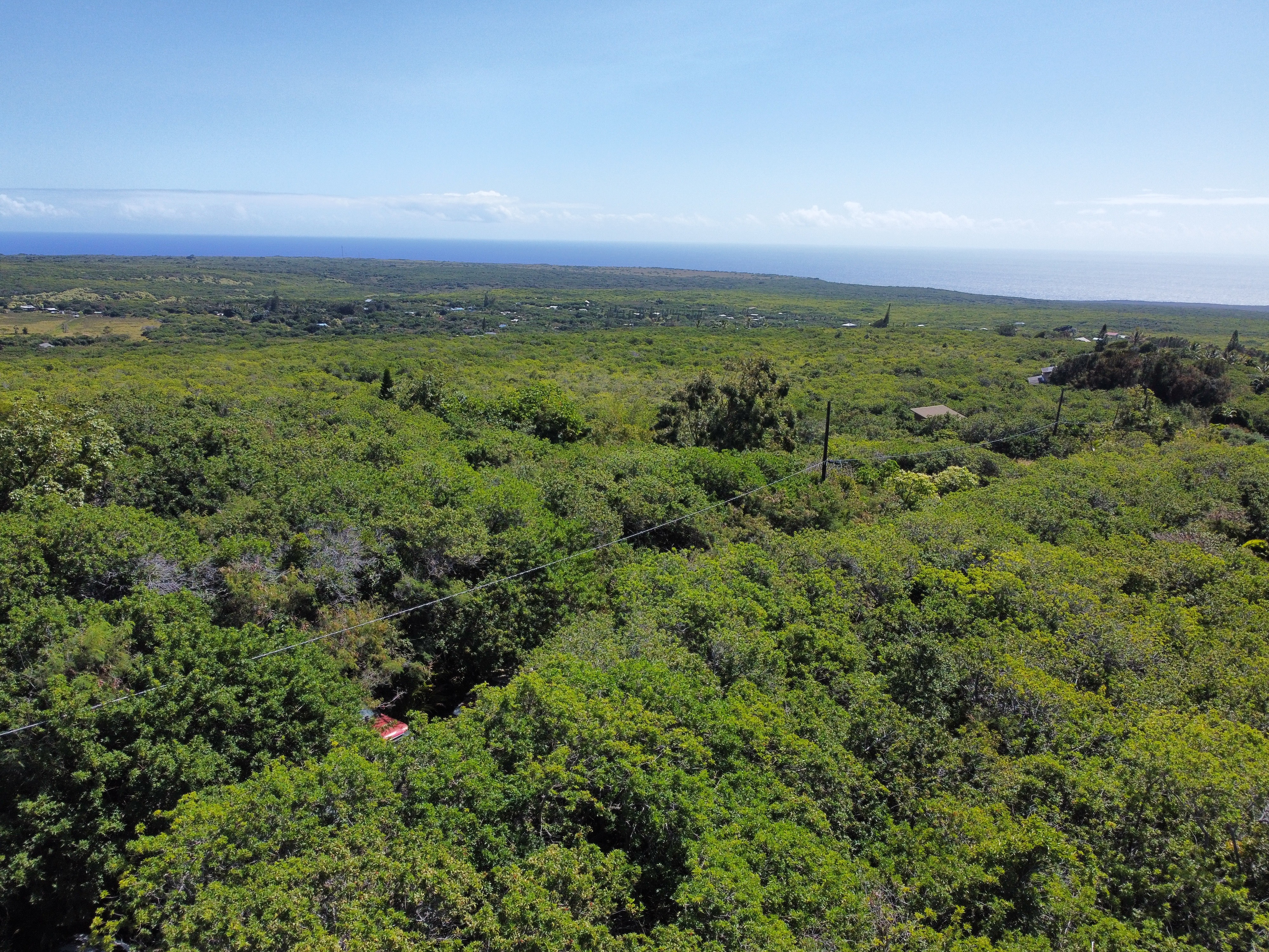 51 Lot 51 Palaoa Road Naalehu, HI 96772 - Photo 2 of 5 an aerial view of a houses with outdoor space and garden view