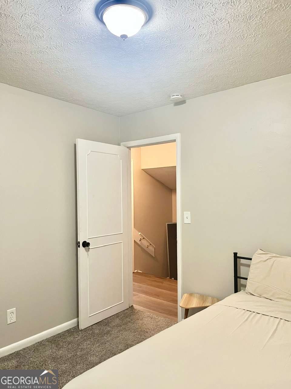 3608 Radcliffe Boulevard Decatur, GA 30034 - Photo 17 of 19 a bedroom with a bed and a shower