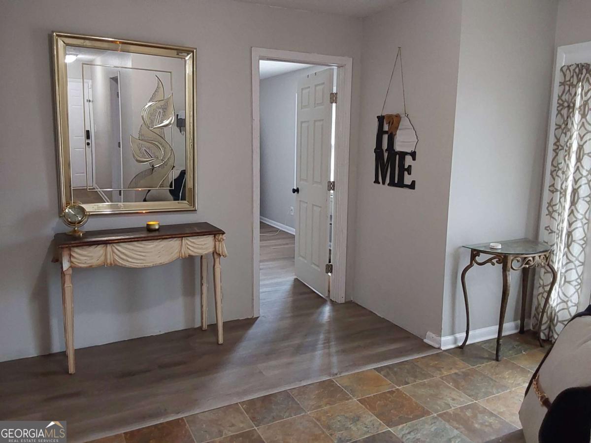 3608 Radcliffe Boulevard Decatur, GA 30034 - Photo 3 of 19 a view of a hallway with closet and front door