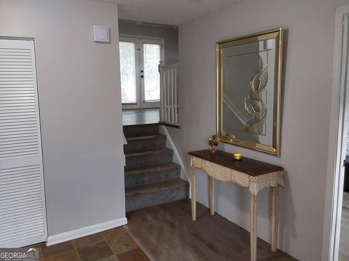 3608 Radcliffe Boulevard Decatur, GA 30034 - Photo 4 of 19 a room with a door and windows