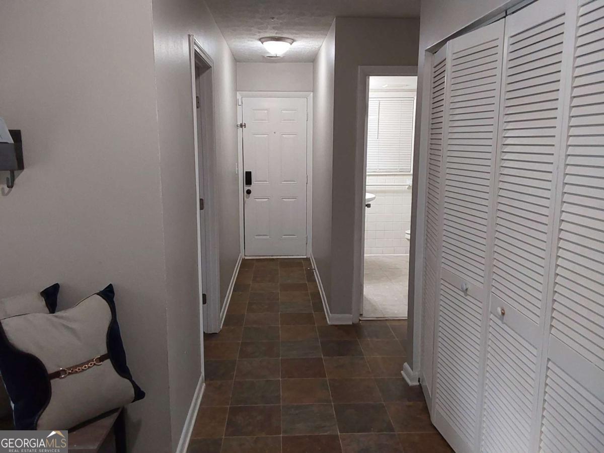 3608 Radcliffe Boulevard Decatur, GA 30034 - Photo 5 of 19 a bathroom with a sink and glass door