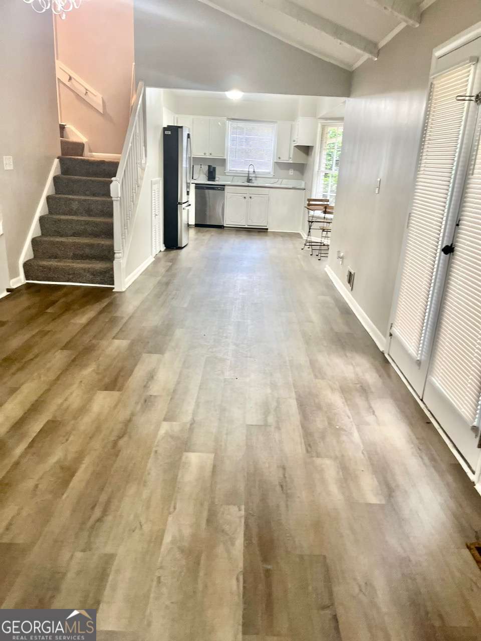 3608 Radcliffe Boulevard Decatur, GA 30034 - Photo 6 of 19 a view of kitchen with wooden floor and electronic appliances