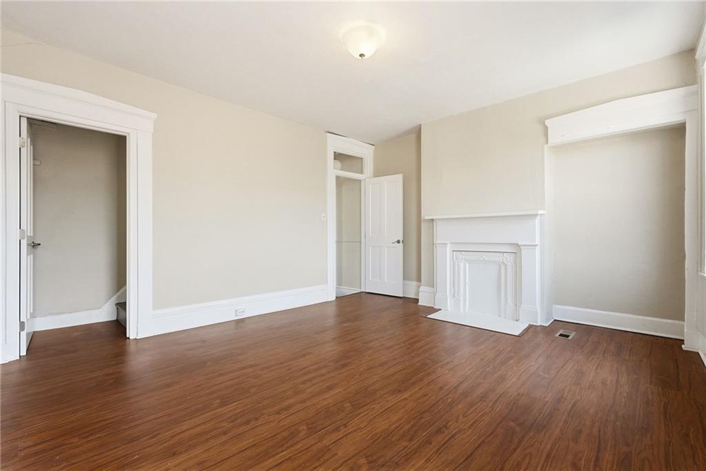 218 39th Street Pittsburgh, PA 15201 - Photo 15 of 24 an empty room with wooden floor & closet area
