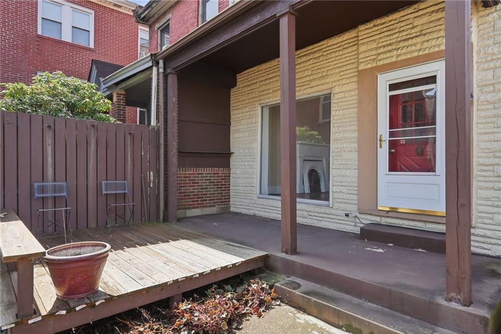 218 39th Street Pittsburgh, PA 15201 - Photo 20 of 24 a view of a deck with wooden floor and fence