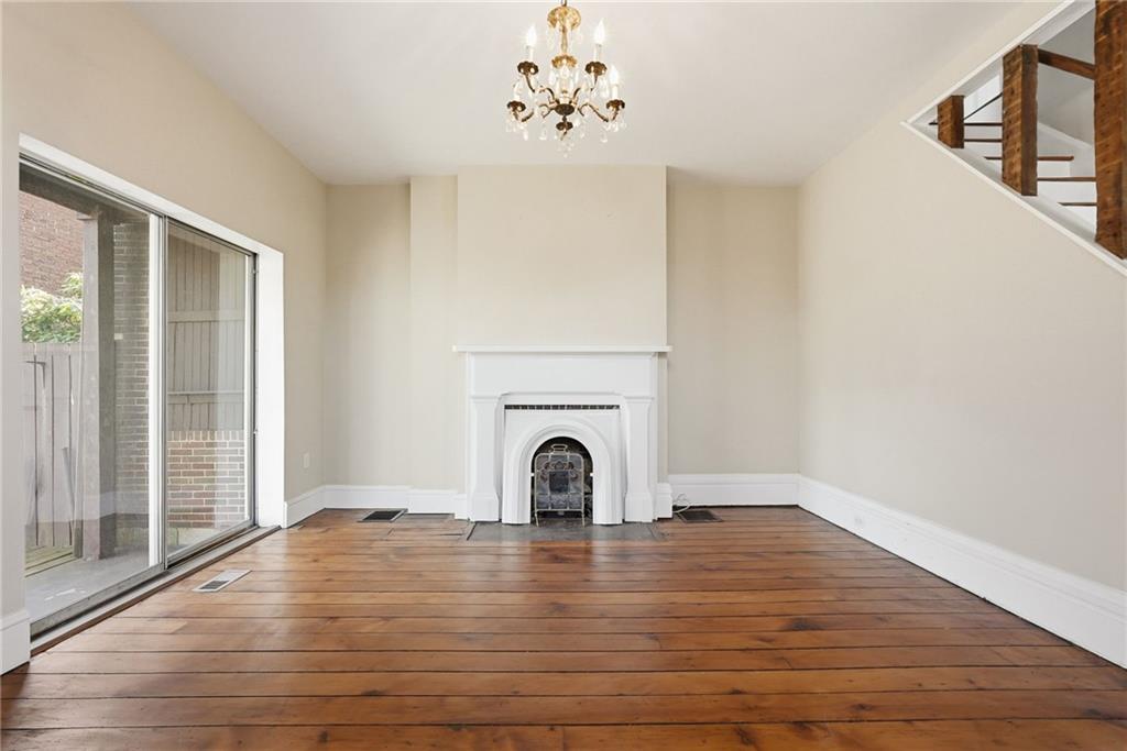 218 39th Street Pittsburgh, PA 15201 - Photo 3 of 24 a view of a livingroom with wooden floor