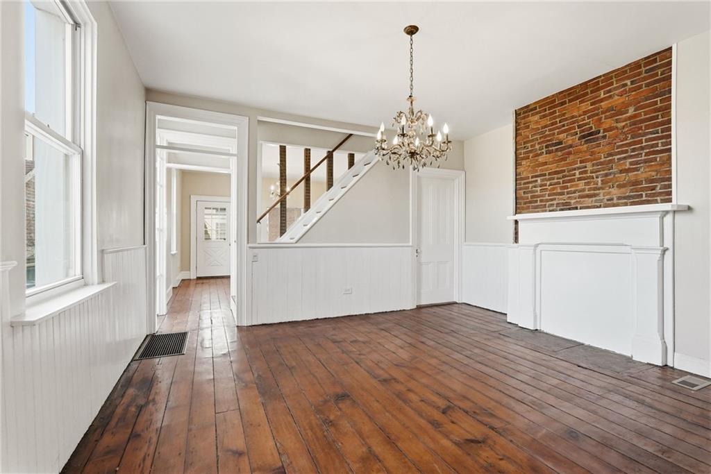 218 39th Street Pittsburgh, PA 15201 - Photo 6 of 24 a view of empty room with wooden floor and fan