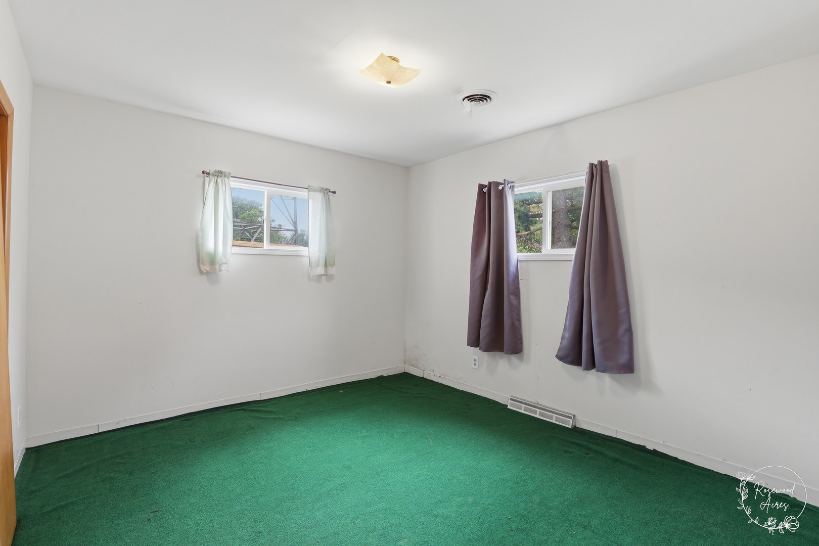 409 Main Street Crescent City, IL 60928 - Photo 15 of 22 a view of an empty room with window