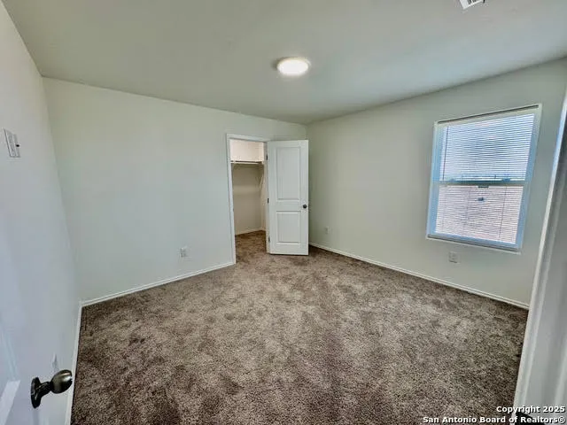 an empty room with closet