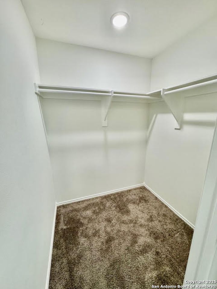 4031 Colibri Drive Laredo, TX 78046 - Photo 10 of 23 a view of a room with shelf