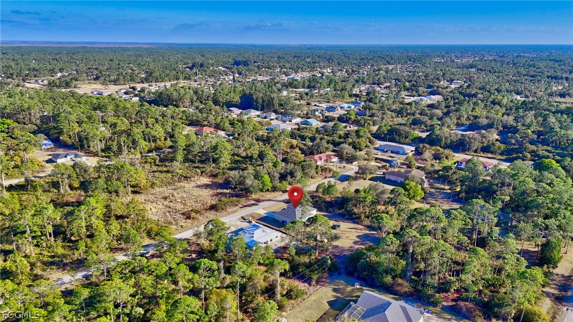 1207 Sheldon Avenue Lehigh Acres, FL 33972 - Photo 44 of 48 an aerial view of multiple house
