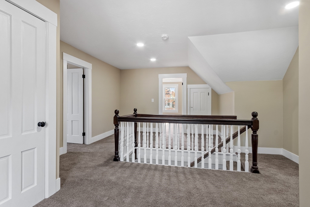 73 Cherry Street Gardner, MA 01440 - Photo 21 of 41 a view of staircase with railing and white walls