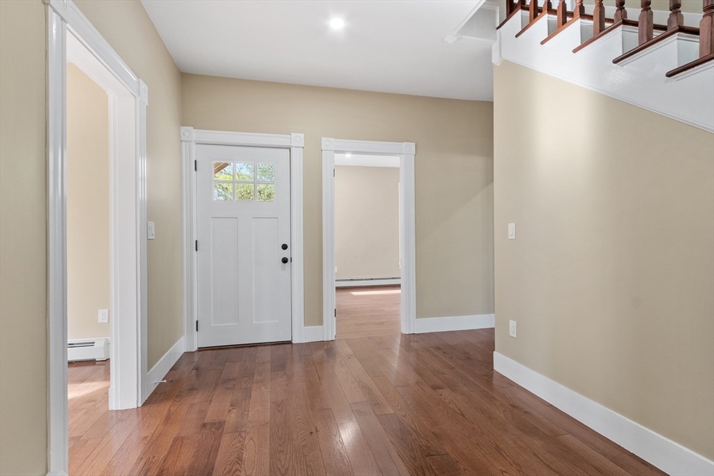 73 Cherry Street Gardner, MA 01440 - Photo 28 of 41 a view of an empty room with wooden floor