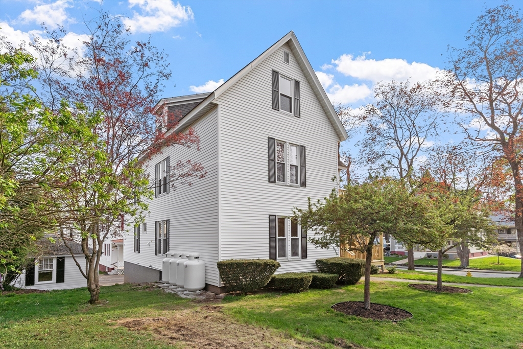 73 Cherry Street Gardner, MA 01440 - Photo 33 of 41 a front view of house with a garden