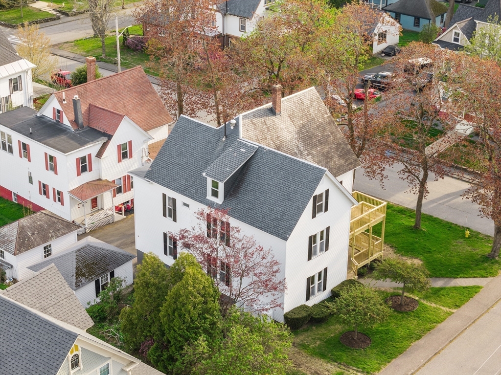 73 Cherry Street Gardner, MA 01440 - Photo 36 of 41 an aerial view of houses with yard