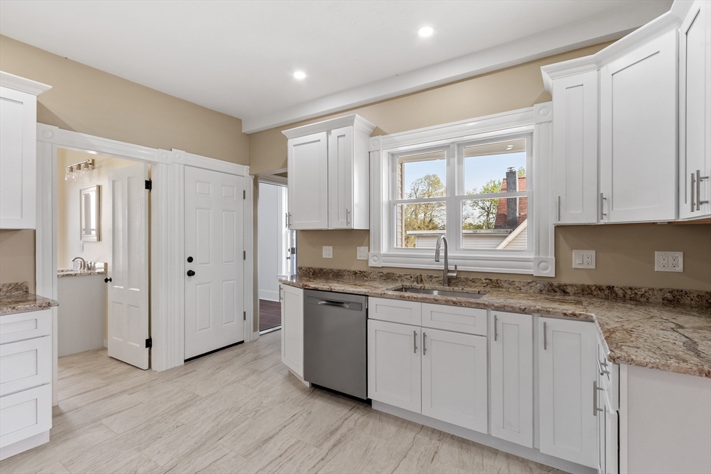 73 Cherry Street Gardner, MA 01440 - Photo 4 of 41 a kitchen with a sink cabinets and window