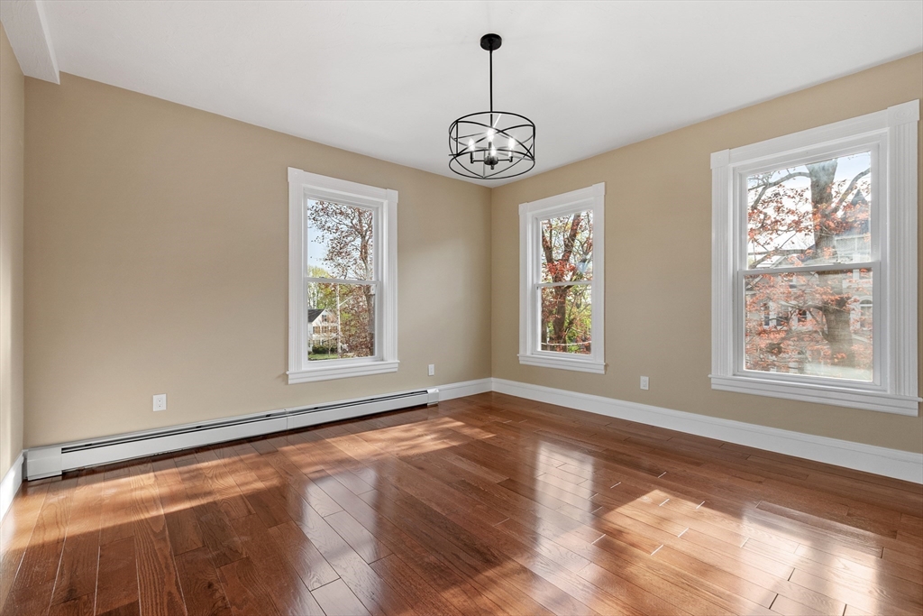 73 Cherry Street Gardner, MA 01440 - Photo 8 of 41 a view of an empty room with windows