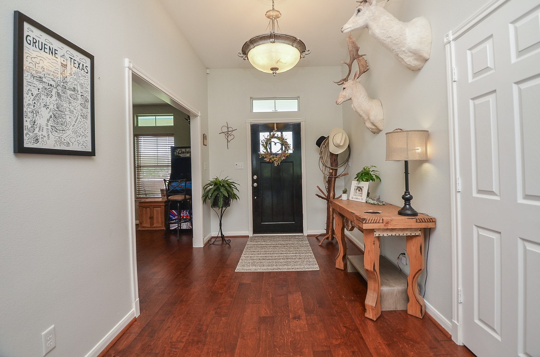 27644 Spring Hill Road Hempstead, TX 77445 - Photo 4 of 50 Here's the alternative view, from back to front, facing the main entry, graced with cool walls and rustic flooring.