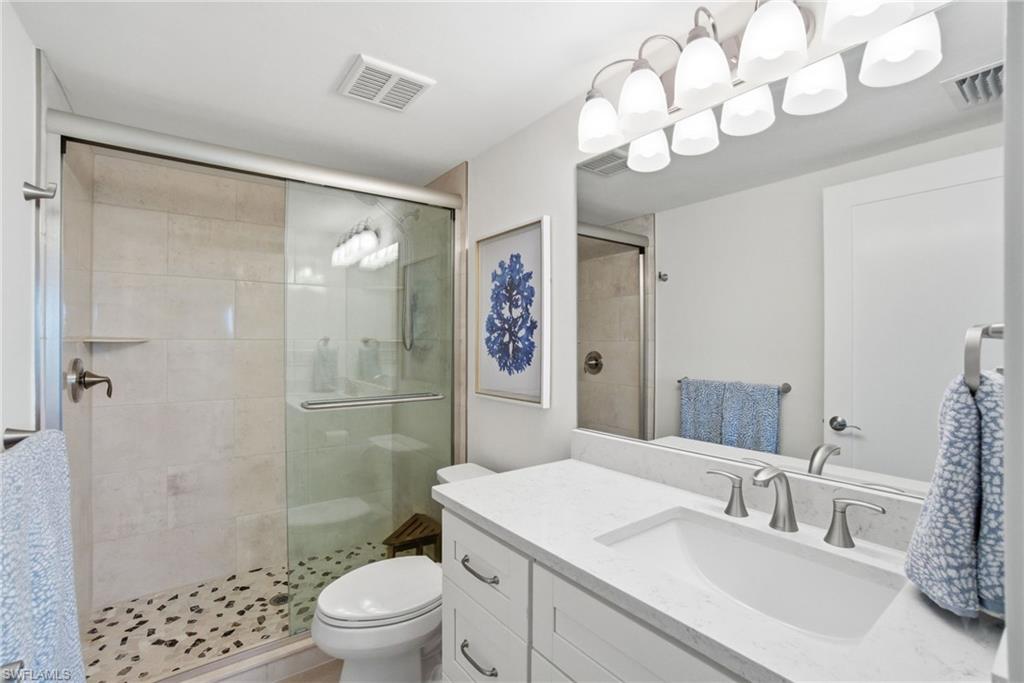 305 Goodlette-Frank Road, Unit C205 Naples, FL 34102 - Photo 12 of 26 Ensuite Bathroom