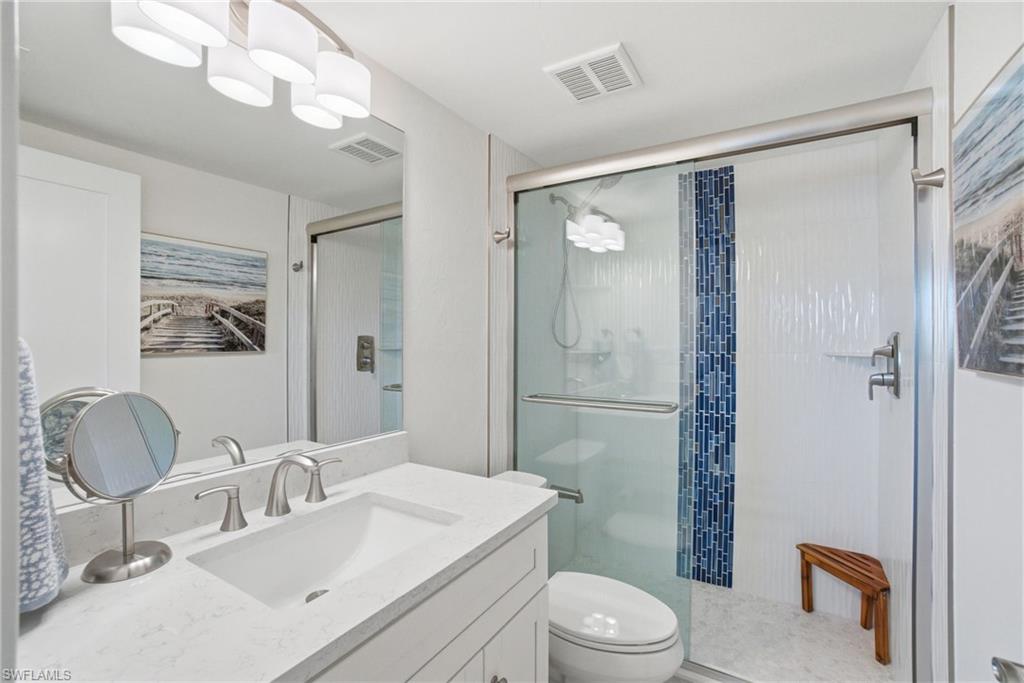 305 Goodlette-Frank Road, Unit C205 Naples, FL 34102 - Photo 15 of 26 Shower includes a lower faucet to rinse sandy toes