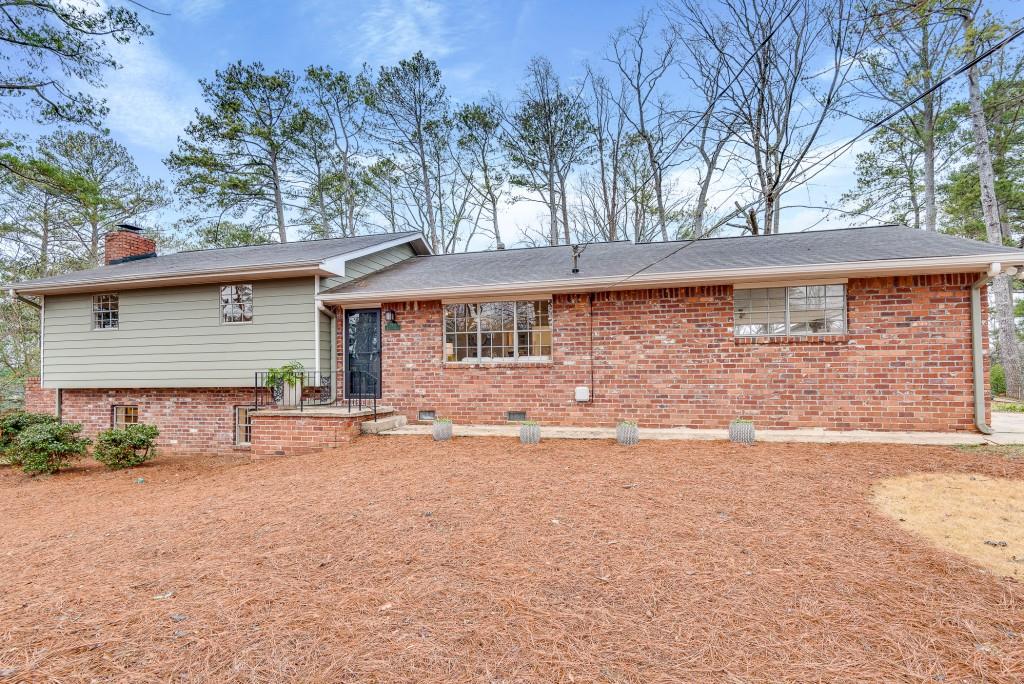 2936 Harcourt Drive Decatur, GA 30033 - Photo 1 of 1 a front view of a house with a yard