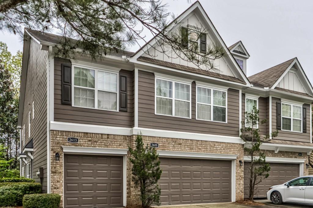 2609 Willow Grove Road Acworth, GA 30101 - Photo 1 of 1 a front view of a house with a tree