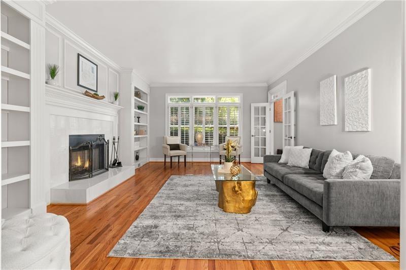 6030 Chimney Springs Road Buford, GA 30518 - Photo 13 of 110 a living room with furniture and a fireplace
