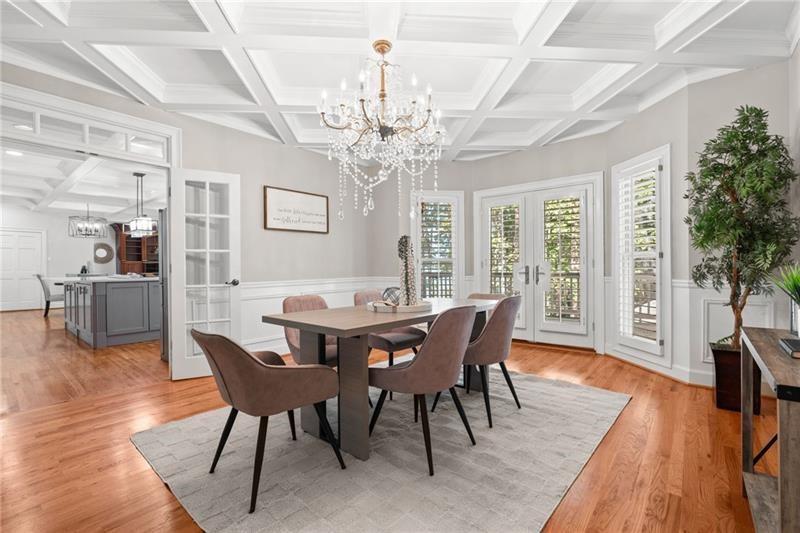 6030 Chimney Springs Road Buford, GA 30518 - Photo 17 of 110 a view of a dining room with furniture window and wooden floor