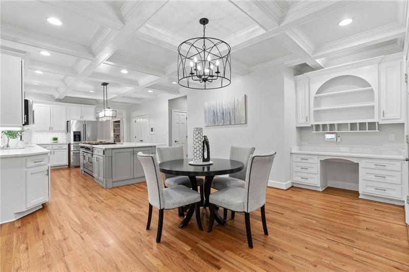 6030 Chimney Springs Road Buford, GA 30518 - Photo 29 of 110 a view of a dining room with furniture window and wooden floor