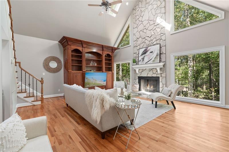 6030 Chimney Springs Road Buford, GA 30518 - Photo 31 of 110 a living room with furniture fireplace and flat screen tv