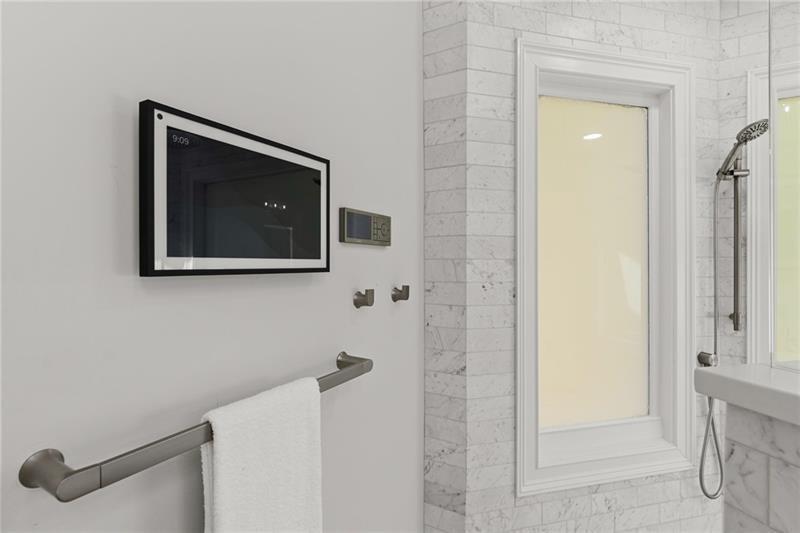 6030 Chimney Springs Road Buford, GA 30518 - Photo 51 of 110 a bathroom with a shower and a sink