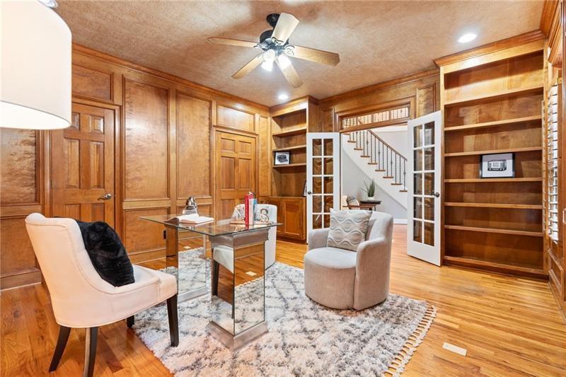 6030 Chimney Springs Road Buford, GA 30518 - Photo 7 of 110 a work room with furniture and wooden floor