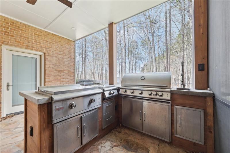 6030 Chimney Springs Road Buford, GA 30518 - Photo 86 of 110 a kitchen with a stove and a sink