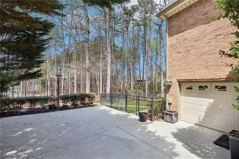 6030 Chimney Springs Road Buford, GA 30518 - Photo 95 of 110 a view of a street with cars parked in front of it