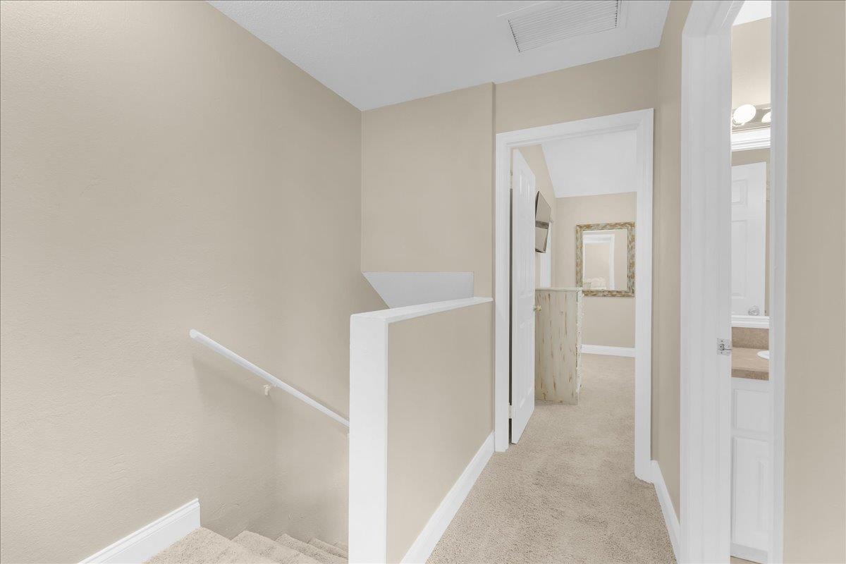 480 Reed Canal Road, Unit 16 Daytona Beach, FL 32119 - Photo 16 of 31 a view of a hallway with closet and bathroom