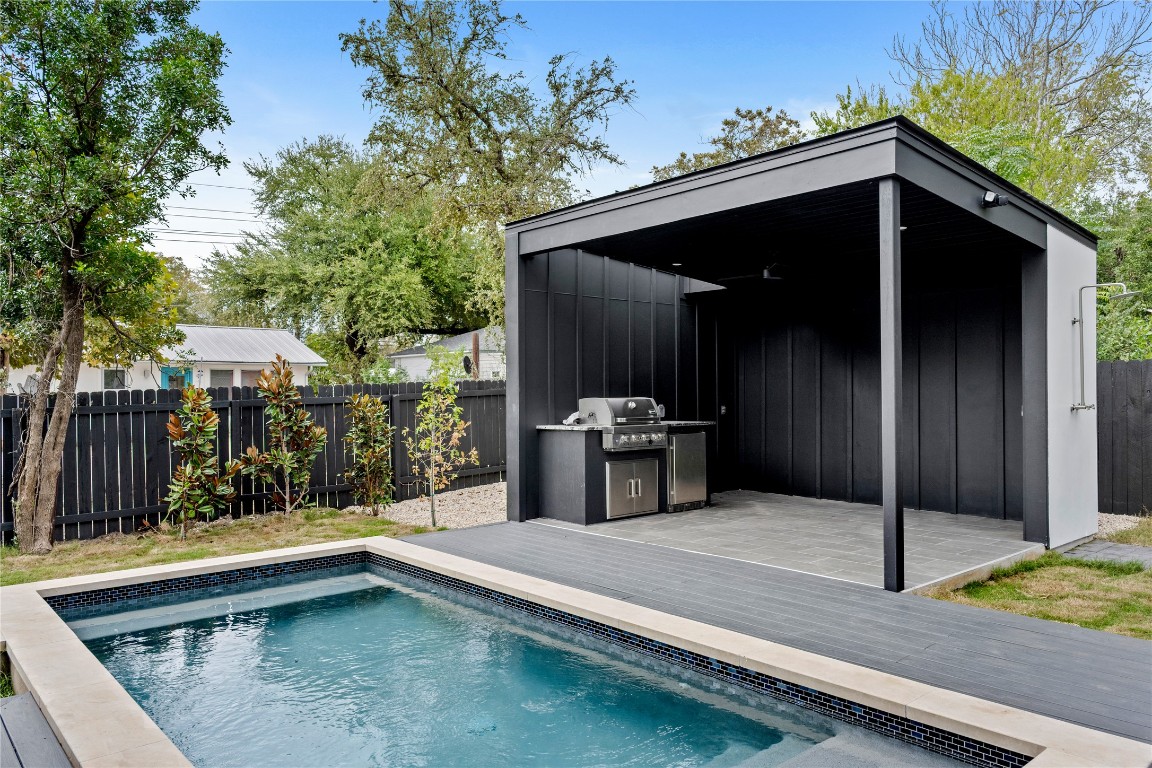 1803 Palo Duro Road Austin, TX 78757 - Photo 21 of 34 View of swimming pool featuring a fenced backyard, a patio area, and grilling area