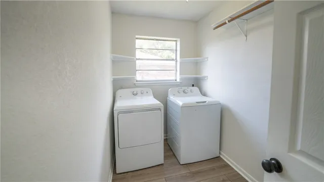 a utility room with dryer and washer