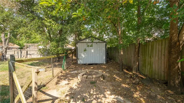 a view of small yard with swimming pool