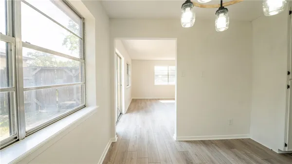 a view of livingroom with wooden floor
