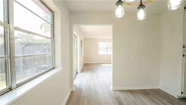 a view of livingroom with wooden floor