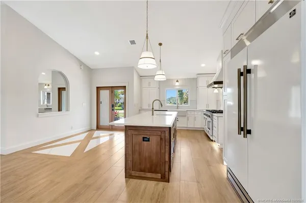 a bathroom with a sink and a shower