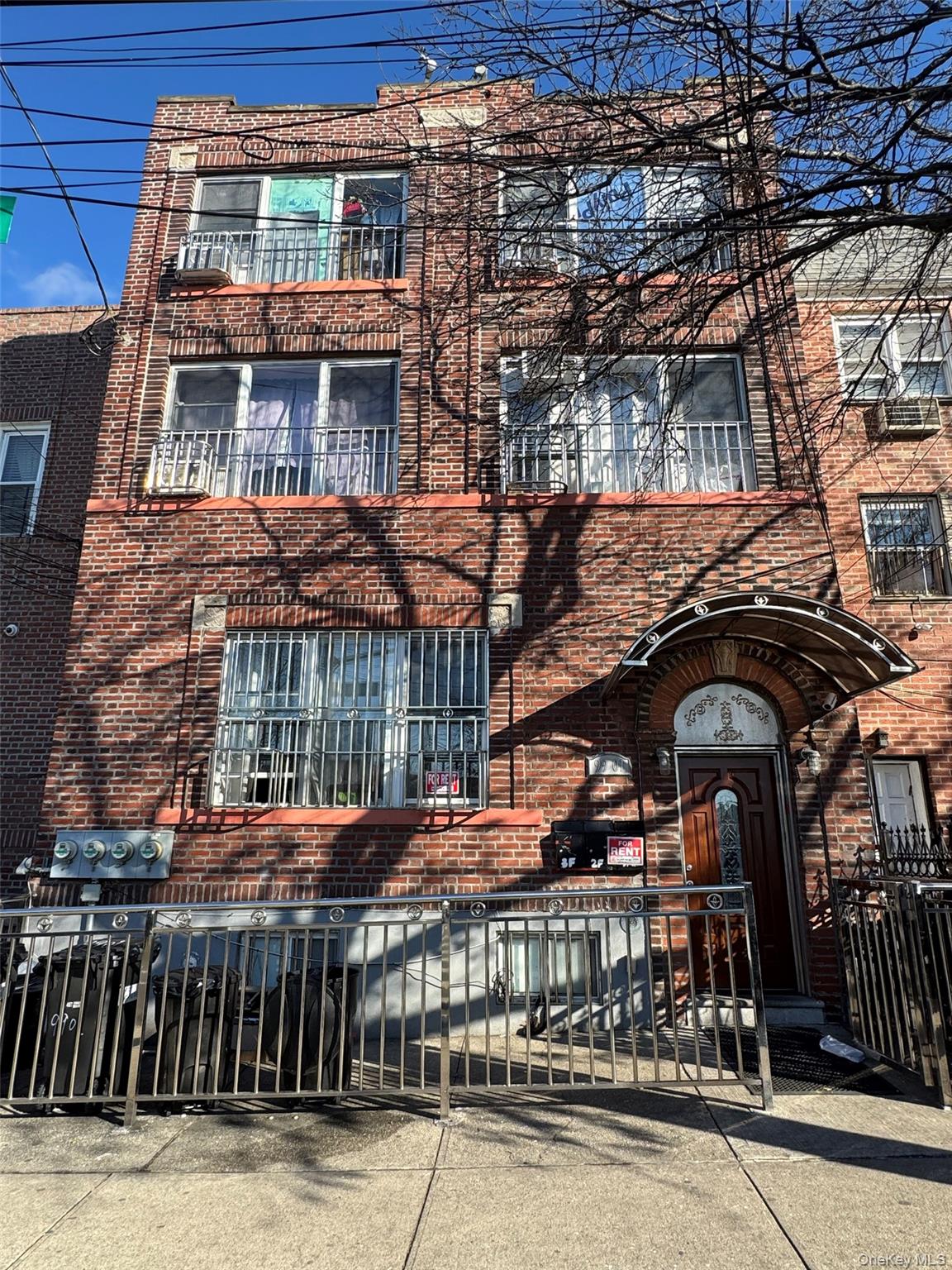 a front view of a building with glass windows