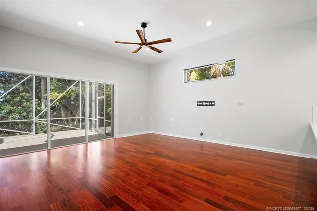 a view of an empty room with a sliding door