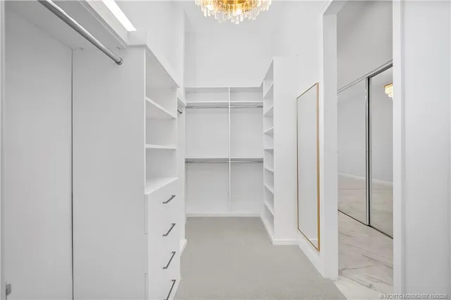 an aerial view of a house with a swimming pool yard and outdoor seating