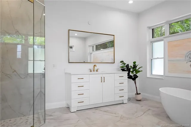 a view of a chairs and tables in the patio