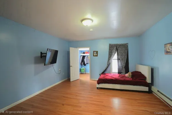 a bedroom with furniture and white walls