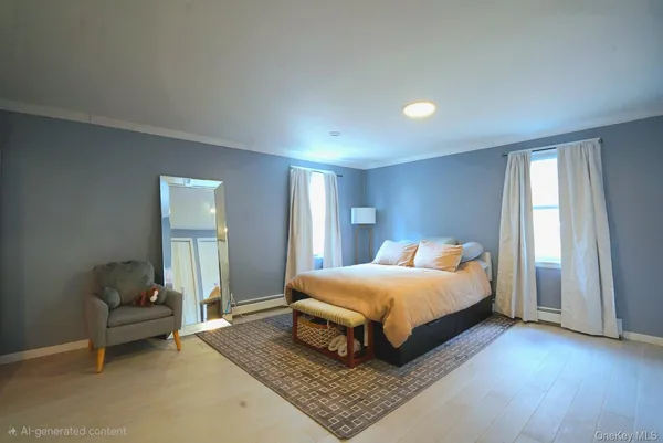 a bedroom with a bed and a couch